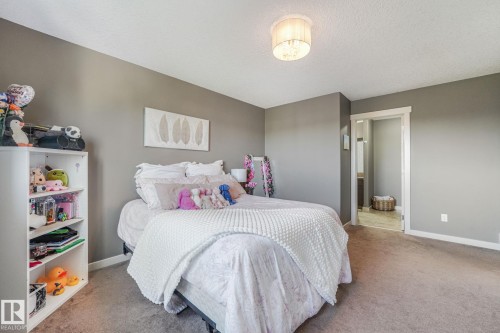 96 Marcelle Point(E), Beaumont, AB - Indoor Photo Showing Bedroom