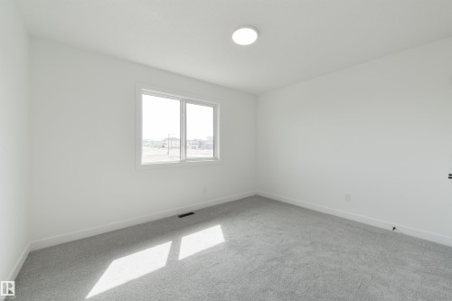1309 Hawks Ridge Link Nw, Edmonton, AB - Indoor Photo Showing Other Room