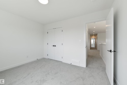 1309 Hawks Ridge Link Nw, Edmonton, AB - Indoor Photo Showing Other Room