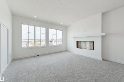 1309 Hawks Ridge Link Nw, Edmonton, AB - Indoor With Fireplace