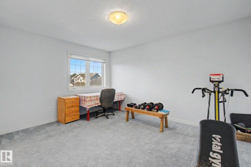 5111 Terwillegar Boulevard Nw, Edmonton, AB - Indoor Photo Showing Gym Room