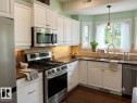 #141 102 West Haven Dr, Leduc, AB  - Indoor Photo Showing Kitchen With Stainless Steel Kitchen With Double Sink With Upgraded Kitchen 