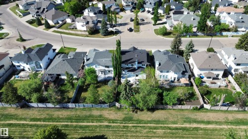 Residential neighborhood featuring multiple properties with varied architectural styles and dark shingle roofs - 11347 10 Avenue, Edmonton, AB - Outdoor With View
