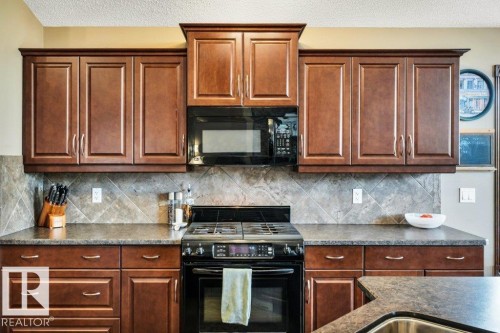 48 Lamplight Drive, Spruce Grove, AB - Indoor Photo Showing Kitchen