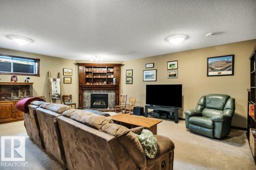48 Lamplight Drive, Spruce Grove, AB - Indoor With Fireplace