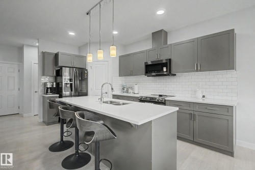 1926 Kroetsch Crescent Sw, Edmonton, AB - Indoor Photo Showing Kitchen With Double Sink With Upgraded Kitchen
