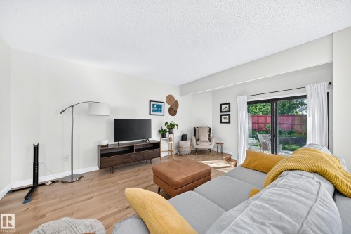 74 Lacombe Point(E), St. Albert, AB - Indoor Photo Showing Living Room