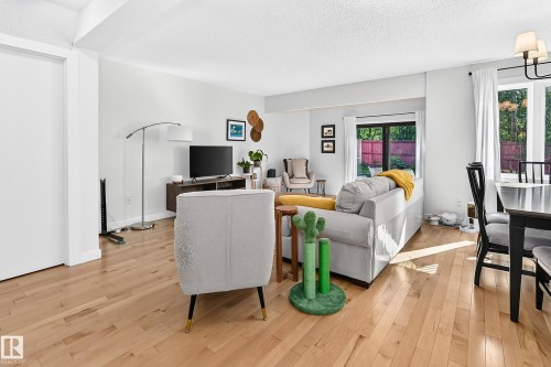 74 Lacombe Point(E), St. Albert, AB - Indoor Photo Showing Living Room