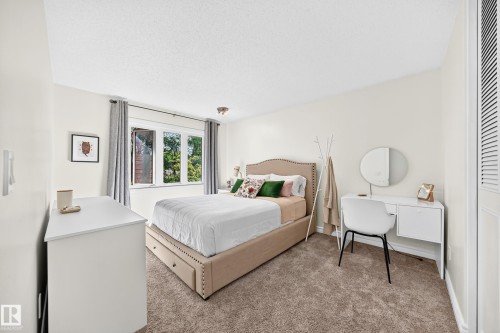 74 Lacombe Point(E), St. Albert, AB - Indoor Photo Showing Bedroom