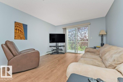 #217 245 Edwards Dr Sw, Edmonton, AB - Indoor Photo Showing Living Room