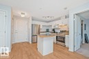 #217 245 Edwards Dr Sw, Edmonton, AB  - Indoor Photo Showing Kitchen With Stainless Steel Kitchen 