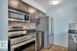 Spacious kitchen with upgraded appliances . - 