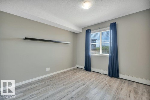 #201 534 Watt Bv Sw, Edmonton, AB - Indoor Photo Showing Other Room