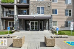 Building facade featuring stone and siding finishes - 
