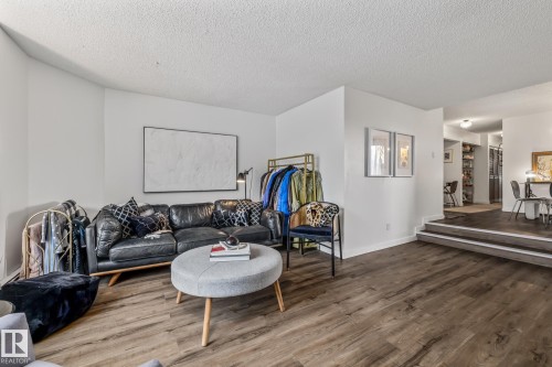 #201 10743 107 St Nw, Edmonton, AB - Indoor Photo Showing Living Room