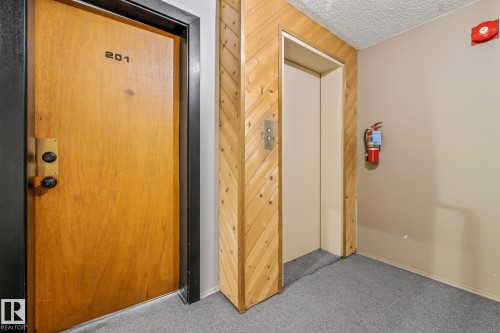#201 10743 107 St Nw, Edmonton, AB - Indoor Photo Showing Other Room