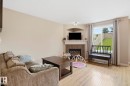 91 Hartwick Loop, Spruce Grove, AB  - Indoor Photo Showing Living Room With Fireplace 