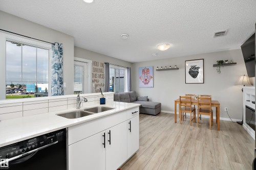 #65 50 Mclaughlin Dr, Spruce Grove, AB - Indoor Photo Showing Kitchen With Double Sink