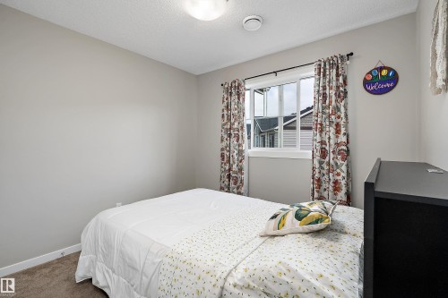 #65 50 Mclaughlin Dr, Spruce Grove, AB - Indoor Photo Showing Bedroom