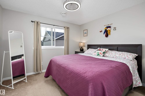 #65 50 Mclaughlin Dr, Spruce Grove, AB - Indoor Photo Showing Bedroom