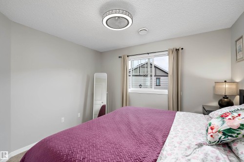 #65 50 Mclaughlin Dr, Spruce Grove, AB - Indoor Photo Showing Bedroom
