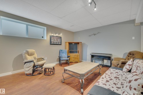 15 Douglas Crescent, Leduc, AB - Indoor Photo Showing Other Room With Fireplace
