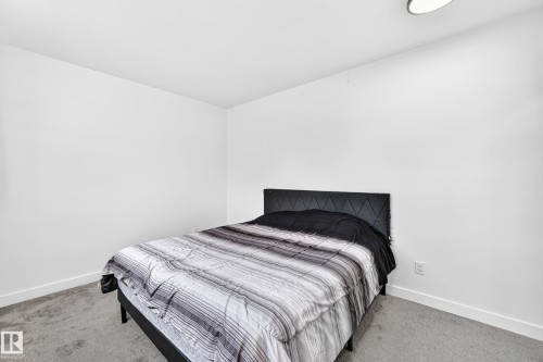 8033 27 Avenue Nw, Edmonton, AB - Indoor Photo Showing Bedroom