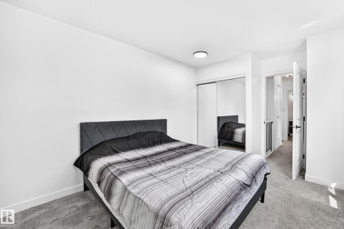 8033 27 Avenue Nw, Edmonton, AB - Indoor Photo Showing Bedroom