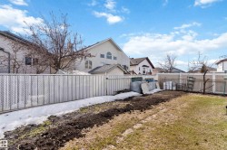 Expansive backyard with a combination chain link and privacy fence - 