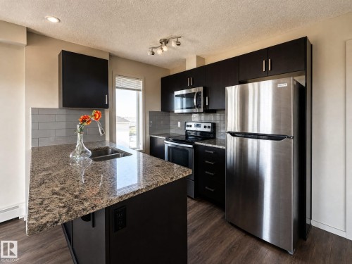 #419 142 Ebbers Bv Nw, Edmonton, AB - Indoor Photo Showing Kitchen With Double Sink