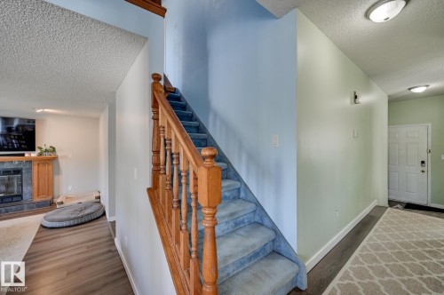 5507 179 Street, Edmonton, AB - Indoor Photo Showing Other Room With Fireplace