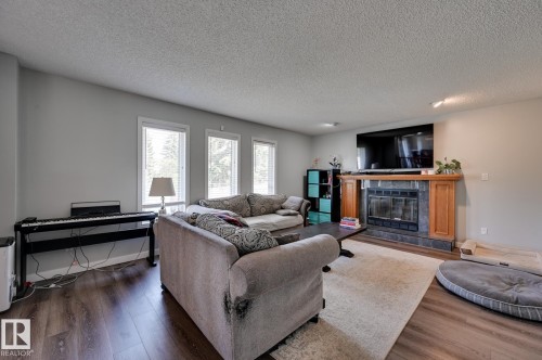5507 179 Street, Edmonton, AB - Indoor Photo Showing Living Room With Fireplace