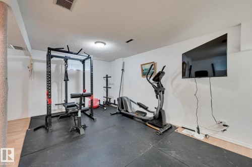 5507 179 Street, Edmonton, AB - Indoor Photo Showing Gym Room