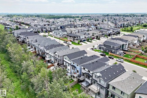 Expansive residential area featuring numerous multi-story homes with pitched roofs - 22270 99A Avenue Nw, Edmonton, AB - Outdoor With View