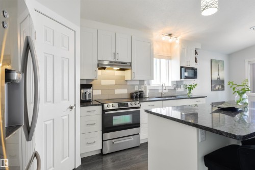 417 Hollick-Kenyon Road Nw, Edmonton, AB - Indoor Photo Showing Kitchen With Upgraded Kitchen