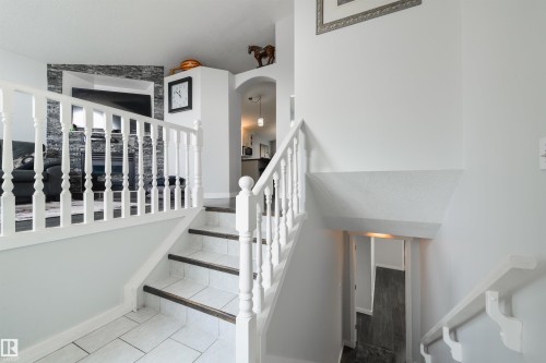 Stairs to go to the lower level - 417 Hollick-Kenyon Road Nw, Edmonton, AB - Indoor Photo Showing Other Room
