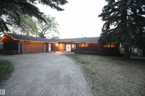 A circular driveway serves the property, and is a very special touch, rarely encountered in our market - 4108 106B Avenue, Edmonton, AB - Outdoor