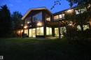 Recent upgrades include 2 high efficiency furnaces, central AC, shingles, and both elevated decks.  The build quality is astounding, and shows craftsmanship - 4108 106B Avenue, Edmonton, AB  - Outdoor 