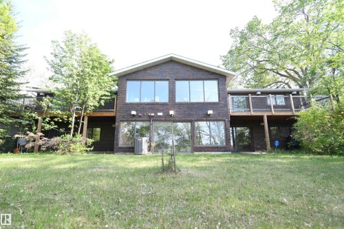 At 11,500 square feet, this is one of the largest lots in the community, with 100 feet of width.  Simply an amazing, quiet location - 4108 106B Avenue, Edmonton, AB - Outdoor With Deck Patio Veranda