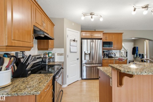 8203 5 Avenue Sw, Edmonton, AB - Indoor Photo Showing Kitchen With Stainless Steel Kitchen