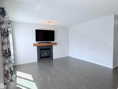7819 173 Avenue, Edmonton, AB - Indoor Photo Showing Living Room With Fireplace