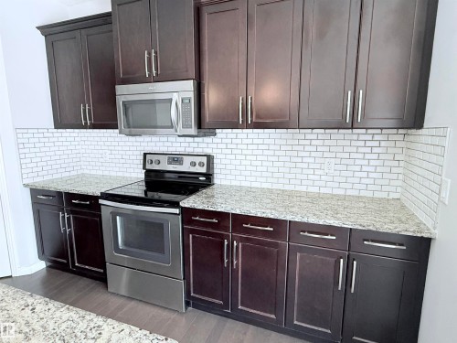 7819 173 Avenue, Edmonton, AB - Indoor Photo Showing Kitchen With Upgraded Kitchen