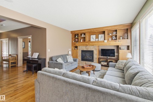 12429 17A Avenue Sw, Edmonton, AB - Indoor Photo Showing Living Room With Fireplace