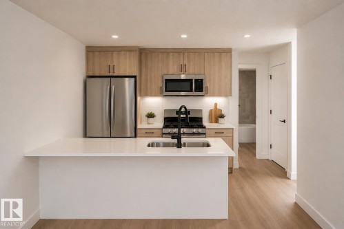 10546 72 Avenue Nw, Edmonton, AB - Indoor Photo Showing Kitchen With Stainless Steel Kitchen With Double Sink