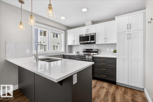 #63 16335 84 St Nw, Edmonton, AB - Indoor Photo Showing Kitchen With Double Sink With Upgraded Kitchen