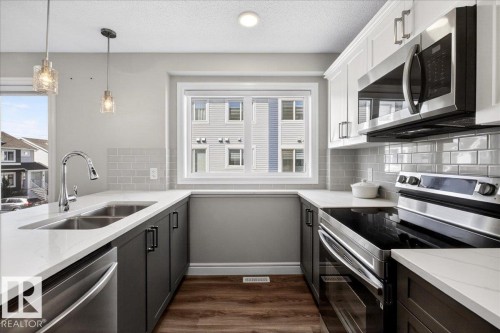 #63 16335 84 St Nw, Edmonton, AB - Indoor Photo Showing Kitchen With Double Sink With Upgraded Kitchen