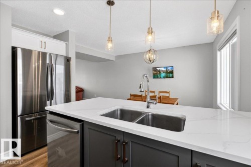 #63 16335 84 St Nw, Edmonton, AB - Indoor Photo Showing Kitchen With Double Sink