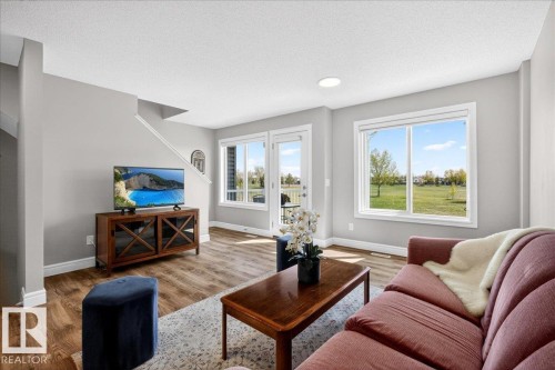 #63 16335 84 St Nw, Edmonton, AB - Indoor Photo Showing Living Room