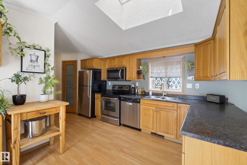 547 Evergreen Park Northwest, Edmonton, AB - Indoor Photo Showing Kitchen With Double Sink