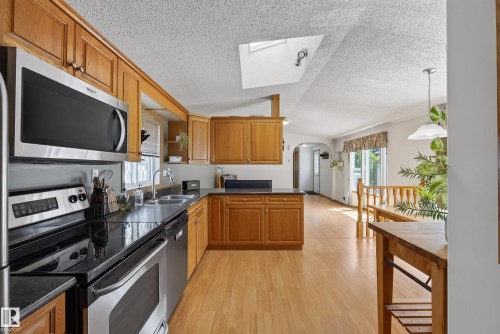 547 Evergreen Park Northwest, Edmonton, AB - Indoor Photo Showing Kitchen With Double Sink